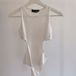 PrettyLittleThing bodysuit. Size 0. Runs big